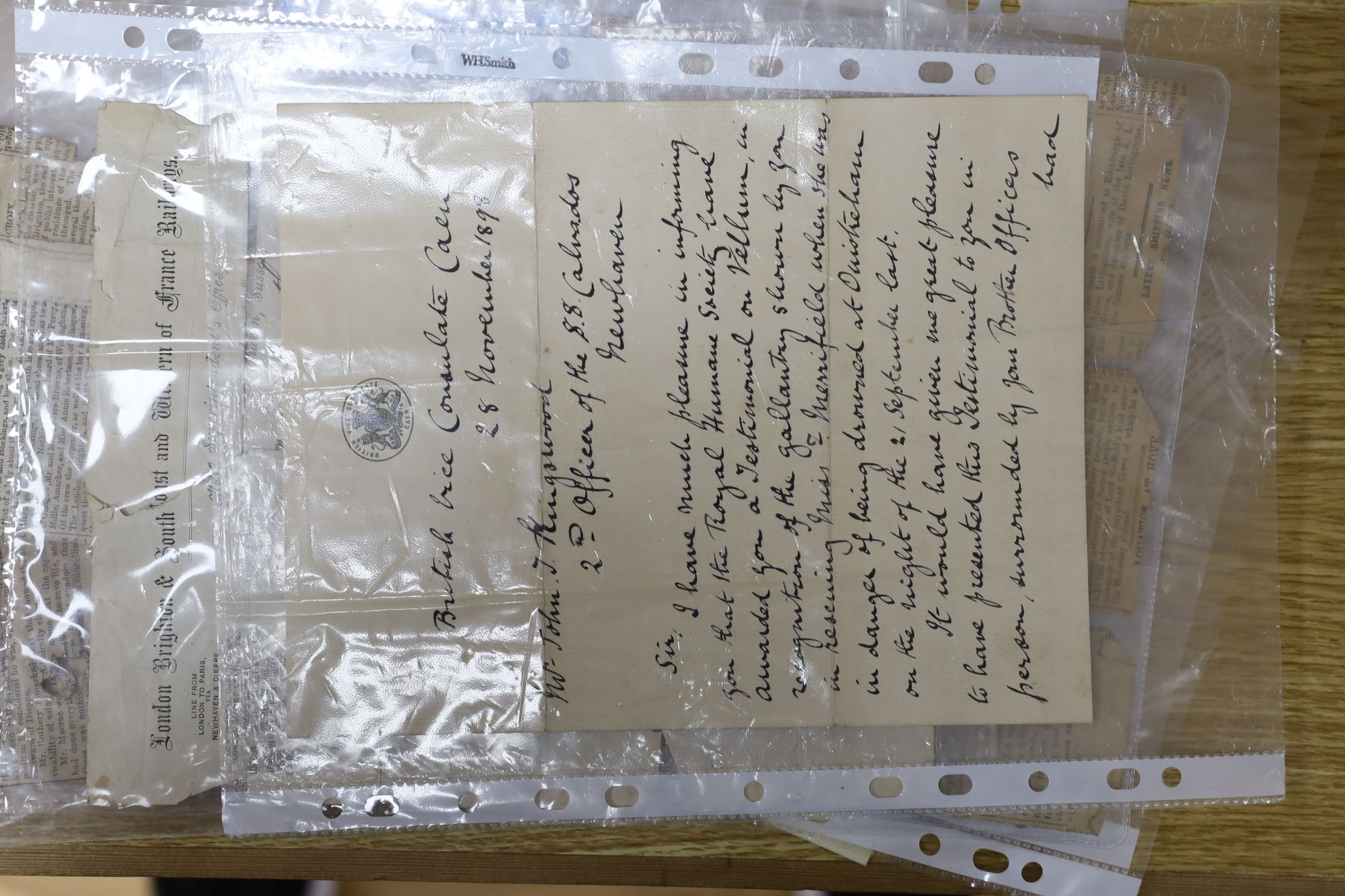 A framed token of appreciation for saving lives at sea awarded to John Thomas Kingswood 1887 with history and related silver watch with engraved inscription inside